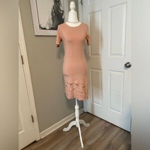 Knitted fired dress with embroidered details